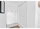 Bright entryway with tile floor, a coat closet and a white door offering a clean, welcoming space at 10365 Paradise Blvd # 4, Treasure Island, FL 33706