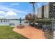 Community grilling area with picnic table and a view of the water at 10365 Paradise Blvd # 4, Treasure Island, FL 33706