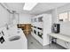 Community laundry room with rows of washers and dryers, plus a change machine at 10365 Paradise Blvd # 4, Treasure Island, FL 33706