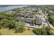 Aerial view of community showing water views and mature trees at 12293 Sailwinds Dr # 206, Largo, FL 33773