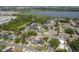 Aerial view of property with water views and community pool at 12293 Sailwinds Dr # 206, Largo, FL 33773