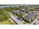 Aerial view of property showing parking, pool and landscaping at 12293 Sailwinds Dr # 206, Largo, FL 33773