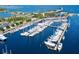 Aerial view of marina with many boats docked, with the beautiful, bright blue ocean in the background at 130 4Th N Ave # 608, St Petersburg, FL 33701