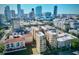 Stunning aerial view of a residential building complex with a beautiful city skyline backdrop, ideal for urban living at 130 4Th N Ave # 608, St Petersburg, FL 33701