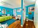 Cozy living room with vibrant walls, hardwood floors, and comfortable seating at 130 4Th N Ave # 608, St Petersburg, FL 33701