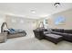 Spacious bonus room with neutral carpet, providing versatile living and entertainment space at 13310 Waterford Run Dr, Riverview, FL 33569