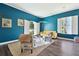 Bright living room with comfortable seating and bright walls at 13310 Waterford Run Dr, Riverview, FL 33569