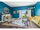 Bright living room with comfortable seating and bright walls at 13310 Waterford Run Dr, Riverview, FL 33569