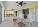 This screened in porch offers lots of seating and stunning views of the outdoors at 13310 Waterford Run Dr, Riverview, FL 33569