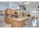 Gourmet kitchen featuring custom cabinets, granite countertops, and stainless steel appliances at 14119 Stonegate Dr, Tampa, FL 33624
