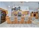 Spacious kitchen with a center island, granite countertops, and stainless steel appliances at 14119 Stonegate Dr, Tampa, FL 33624