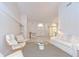 Spacious living room with high ceilings, marble floors, and abundant natural light at 14119 Stonegate Dr, Tampa, FL 33624