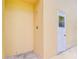 Simple outdoor shower with concrete flooring and a painted block wall at 14119 Stonegate Dr, Tampa, FL 33624