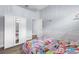 Bright bedroom with hardwood floors. Features closet and storage space. Great natural light at 14521 Mirasol Manor Ct, Tampa, FL 33626