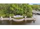 Waterchase community entrance with a stone wall, fountains, and manicured landscaping at 14521 Mirasol Manor Ct, Tampa, FL 33626