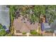 Overhead view of home showing the brown roof and skylights surrounded by landscaping at 150 23Rd N Ave, St Petersburg, FL 33704