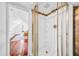 Bathroom featuring a stand-up shower with a glass door and built in shelves at 150 23Rd N Ave, St Petersburg, FL 33704