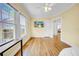 Sunlit bedroom with hardwood floors and neutral decor, offering a serene and inviting space at 150 23Rd N Ave, St Petersburg, FL 33704