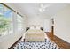 Bright bedroom with hardwood floors, ceiling fan, and lots of natural light at 150 23Rd N Ave, St Petersburg, FL 33704