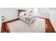 Bedroom features a large rug, hardwood floors, and white walls, creating a bright and airy space at 150 23Rd N Ave, St Petersburg, FL 33704