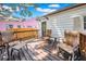 Relaxing deck area with seating, perfect for enjoying the outdoors with views of the yard at 150 23Rd N Ave, St Petersburg, FL 33704