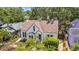 Aerial view of a cozy home with a beautiful yard and mature trees in a peaceful neighborhood at 150 23Rd N Ave, St Petersburg, FL 33704