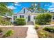 Charming home with lush landscaping and a welcoming front entrance at 150 23Rd N Ave, St Petersburg, FL 33704