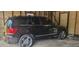 Spacious garage interior with a black SUV, ample room for parking and storage at 150 23Rd N Ave, St Petersburg, FL 33704
