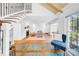 Spacious open-concept with staircase, stylish furniture, and fireplace, perfect for entertaining at 150 23Rd N Ave, St Petersburg, FL 33704