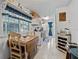Charming kitchen and dining area with tiled floors, lots of natural light, and bright, inviting décor at 17301 Estes Rd, Lutz, FL 33548