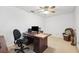 Office featuring a ceiling fan, ample natural light, and functional furnishings for productivity and comfort at 17301 Estes Rd, Lutz, FL 33548