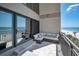 Relax on this spacious balcony with comfortable seating and breathtaking ocean views at 19700 Gulf Blvd # 403, Indian Shores, FL 33785
