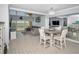 Comfortable dining area with ocean views, perfect for enjoying meals with Gathering and friends at 19700 Gulf Blvd # 403, Indian Shores, FL 33785
