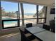 Elegant dining area offering stunning views of the pool, beach, and ocean at 19700 Gulf Blvd # 403, Indian Shores, FL 33785