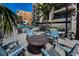 Stylish pool area featuring outdoor seating and a fire pit, perfect for entertaining guests and relaxing at 19700 Gulf Blvd # 403, Indian Shores, FL 33785