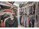 Well-organized walk-in closet featuring ample storage space for clothing, shoes, and accessories at 19700 Gulf Blvd # 403, Indian Shores, FL 33785