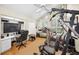 Bright home gym with exercise equipment, natural light, and tiled floor at 20 Willowwood Ln, Oldsmar, FL 34677