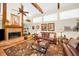 Elegant living area featuring beamed ceilings, terra cotta tile floors, and cozy seating at 20 Willowwood Ln, Oldsmar, FL 34677