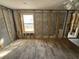 Bright living room featuring new floors and a large window, ready for personalization and comfortable living at 204 162Nd Ave, Redington Beach, FL 33708