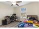 Bright bedroom featuring a desk for work and window with view, making this ideal space at 21046 Passive Porch Dr, Land O Lakes, FL 34637