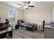 Comfortable bedroom with natural light and ample space for work and relaxation at 21046 Passive Porch Dr, Land O Lakes, FL 34637