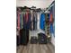 Walk-in closet features ample shelving and hanging space at 21046 Passive Porch Dr, Land O Lakes, FL 34637