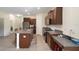 Well-equipped kitchen featuring granite countertops, stainless steel appliances, and ample cabinet space at 21046 Passive Porch Dr, Land O Lakes, FL 34637