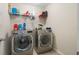 Laundry room featuring modern washer and dryer at 21046 Passive Porch Dr, Land O Lakes, FL 34637