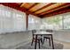 Cozy breakfast nook featuring a light-filled space, wood ceilings, and comfortable seating for two at 2488 Del Rio Way, Dunedin, FL 34698