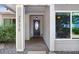Welcoming front entrance with decorative door, sidelight window, and house number at 2558 Arborwood Dr, Valrico, FL 33596