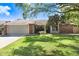 Charming home with well-maintained lawn and mature trees, plus an attached two-car garage at 2558 Arborwood Dr, Valrico, FL 33596