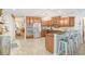 Spacious kitchen with stainless steel appliances, granite countertops, and wood cabinets at 2558 Arborwood Dr, Valrico, FL 33596
