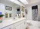Clean bathroom with white cabinets, a shower/tub combo, and neutral decor at 3625 Gaviota Dr, Ruskin, FL 33573