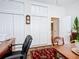 Home office with bright lighting, featuring three closets and comfortable office chair at 3625 Gaviota Dr, Ruskin, FL 33573